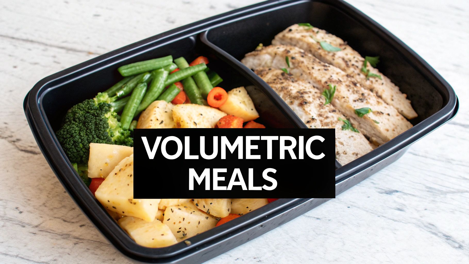 A healthy meal prep container with sliced chicken, broccoli, green beans, carrots, and potatoes.