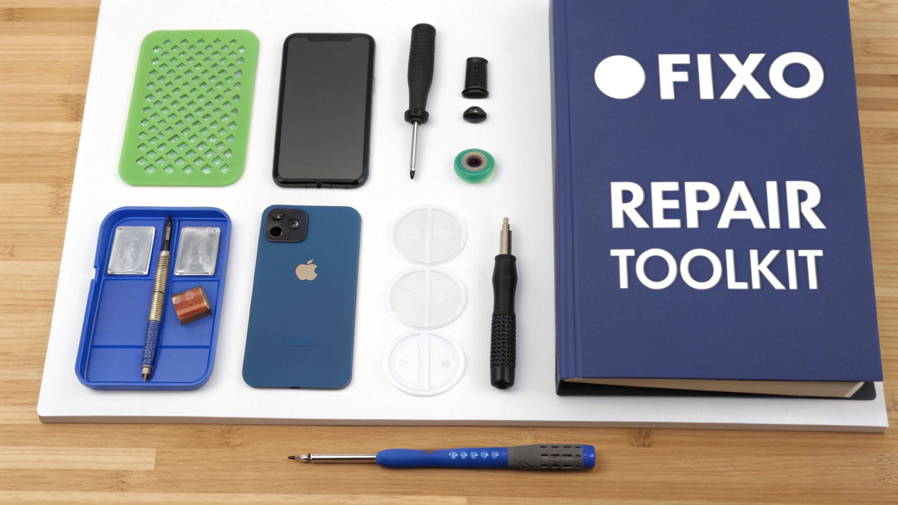 A clean, well-lit workspace with tools laid out for an iPhone screen repair.