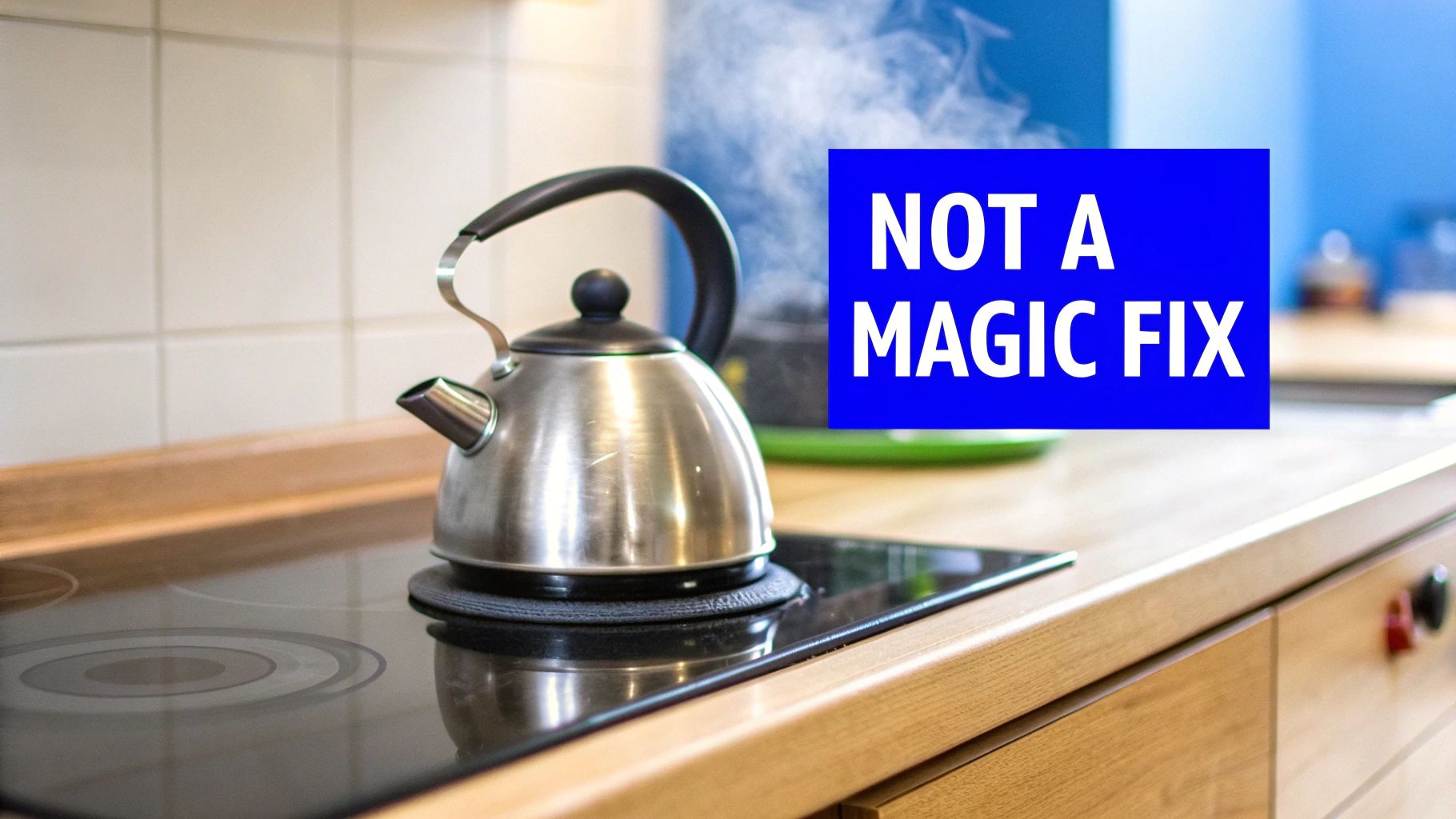 A stainless steel kettle boils on an electric stovetop in a modern kitchen, with steam rising.