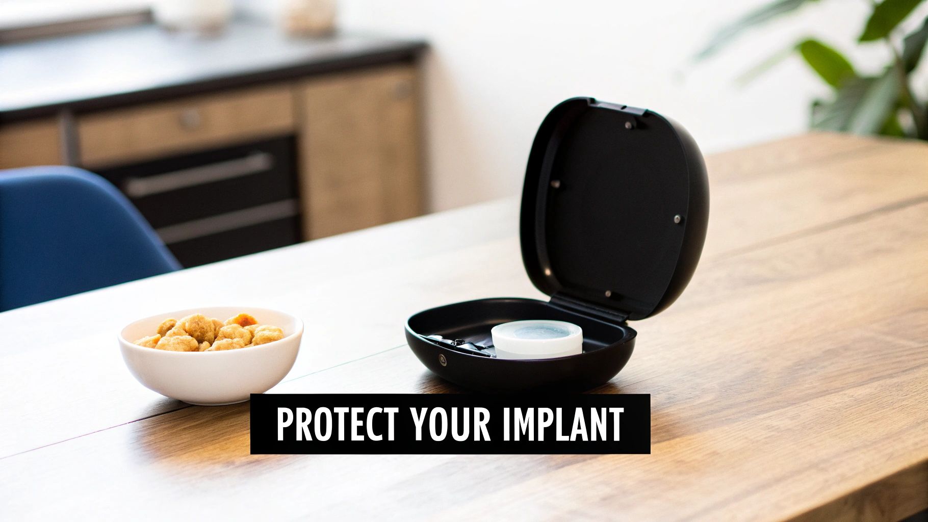 An open black case containing dental care items, next to a snack bowl on a wooden table, for implant protection.