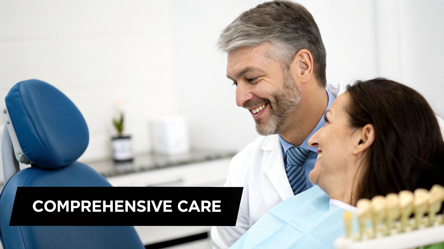 A smiling male dentist provides comprehensive care to a happy female patient in a dental chair.