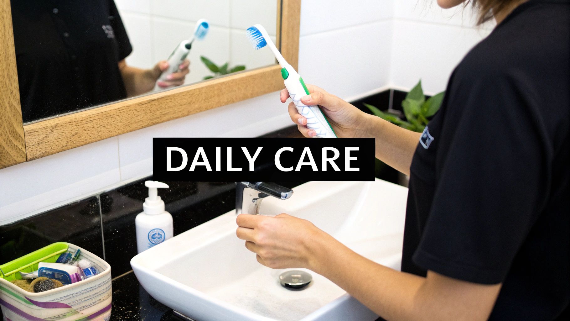 Person holding an electric toothbrush over a sink, preparing for daily dental care routine.