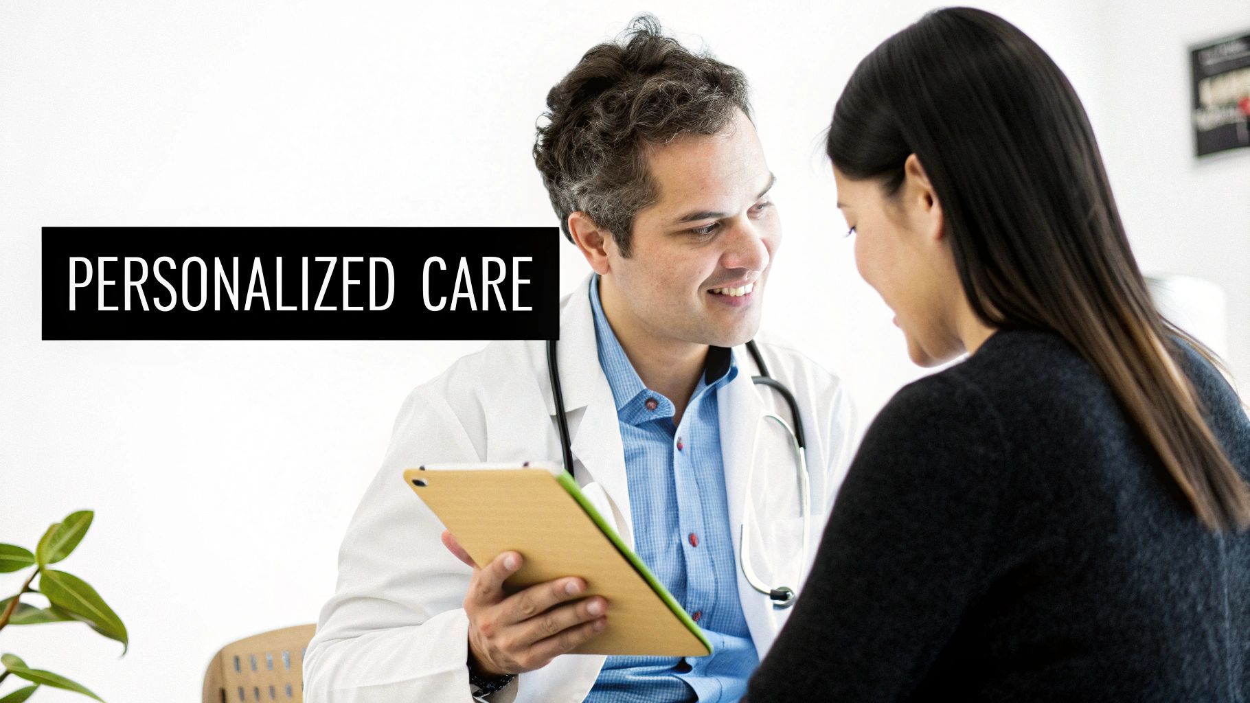 A smiling male doctor in a white coat consults with a female patient, providing personalized care.