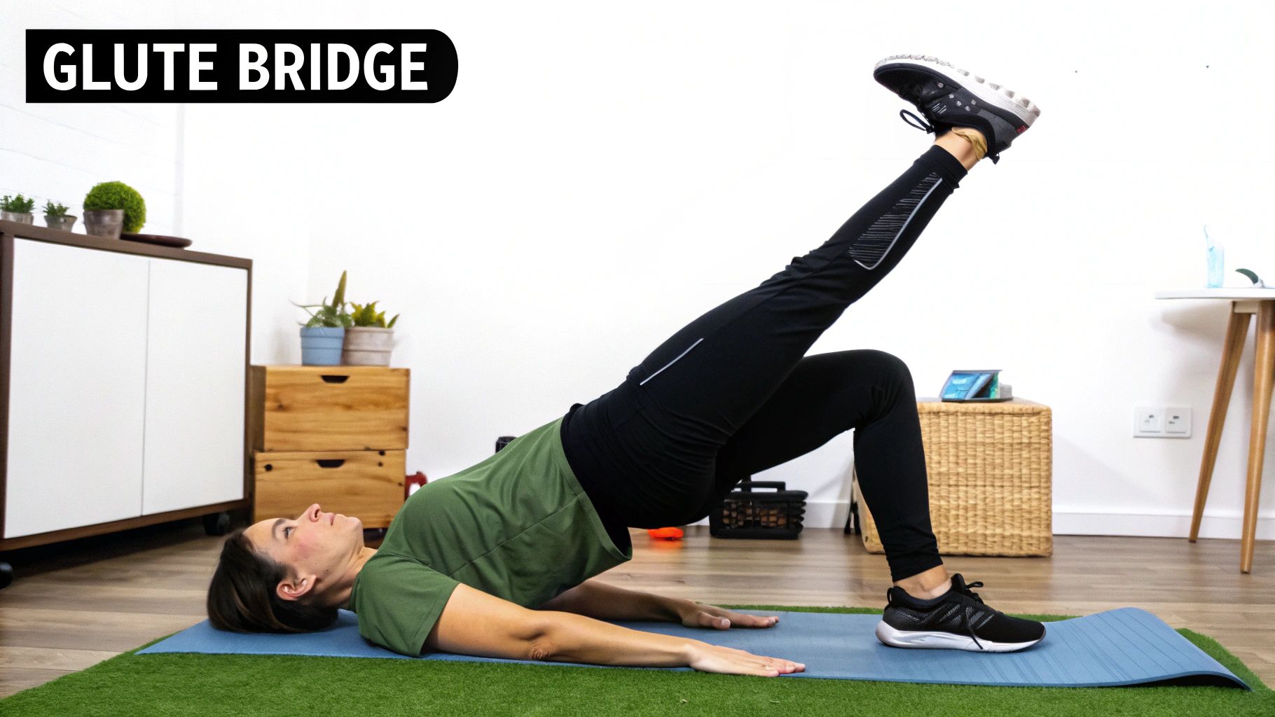 A woman performs a single-leg glute bridge on a blue mat, strengthening her glutes.
