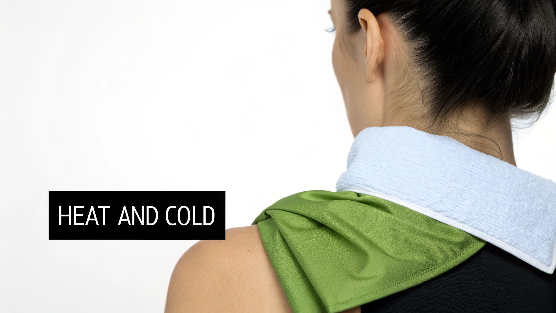 Rear view of a person using a blue towel and green cloth for heat and cold therapy on neck and shoulder.