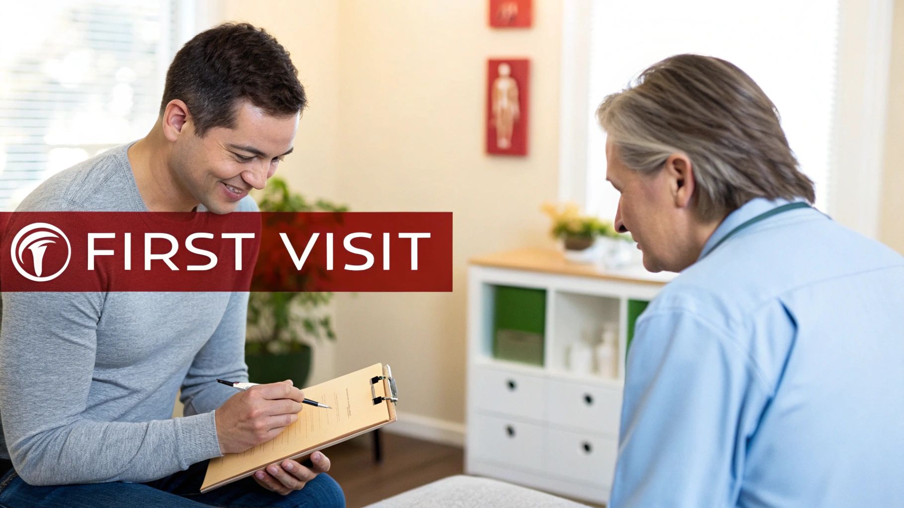 A smiling male patient fills out paperwork on a clipboard during a first visit with a medical professional.