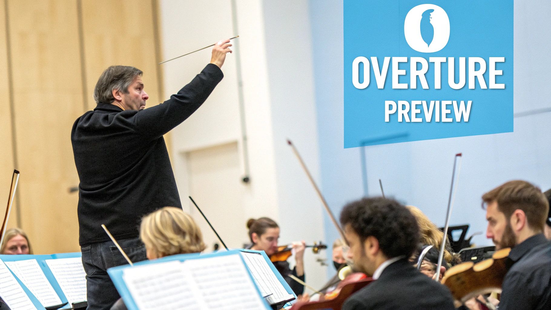 A male conductor leads an orchestra, with musicians playing string instruments and 'Overture Preview' text.