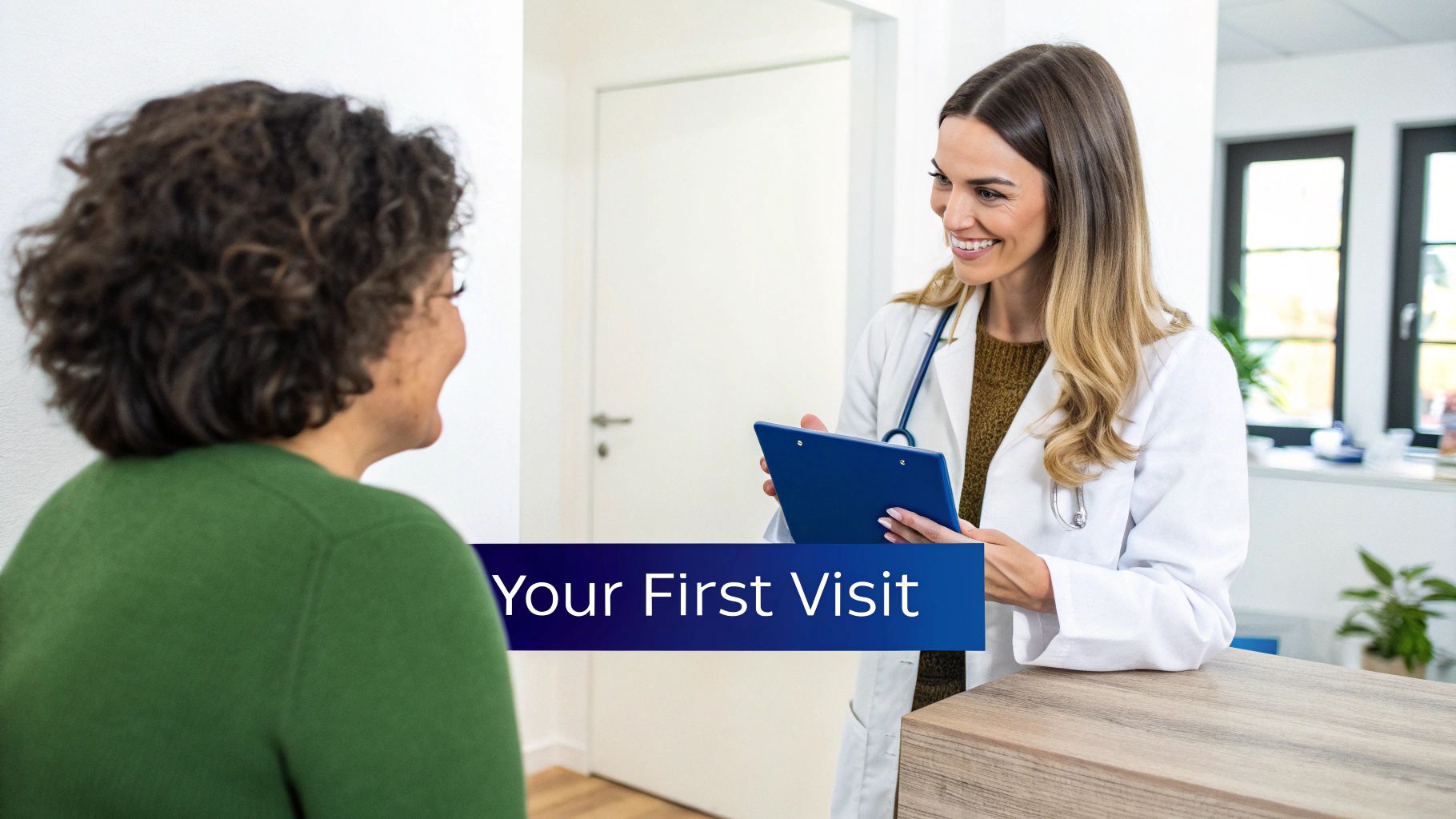 A smiling female doctor talks with a patient at a clinic reception, banner says 'Your First Visit'.