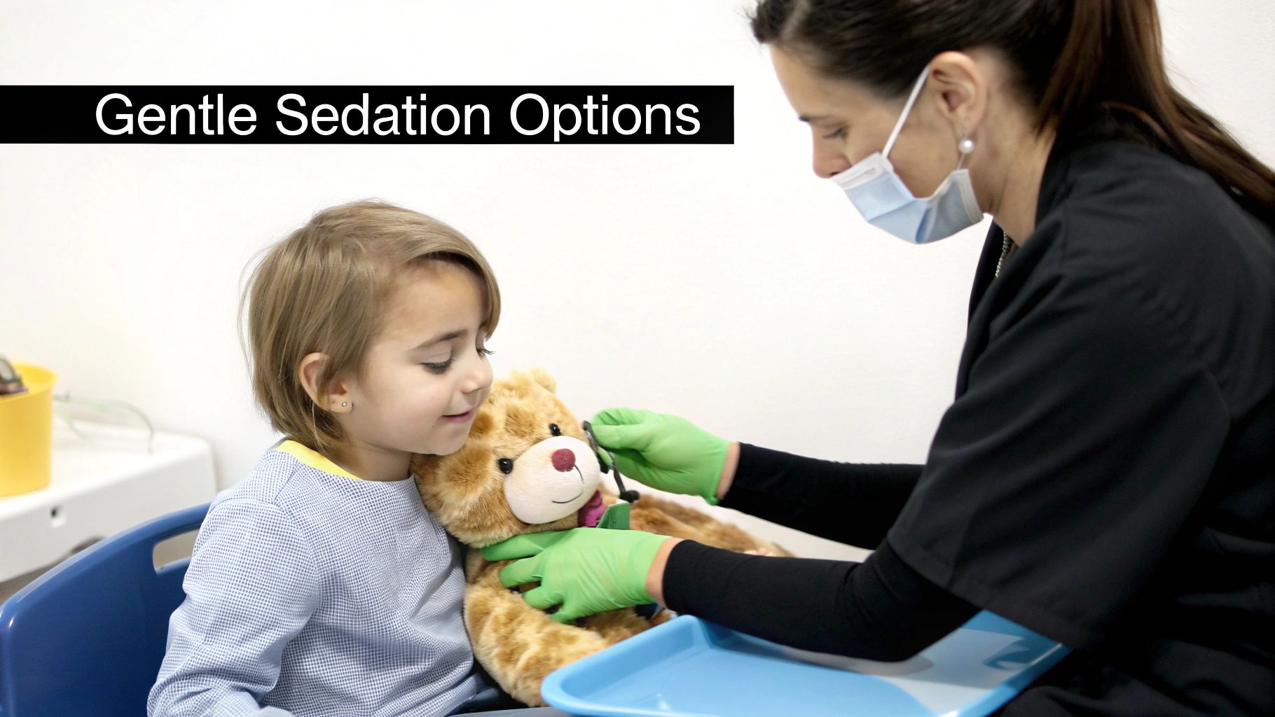 A healthcare professional wearing a mask demonstrates a gentle procedure on a teddy bear for a young child.