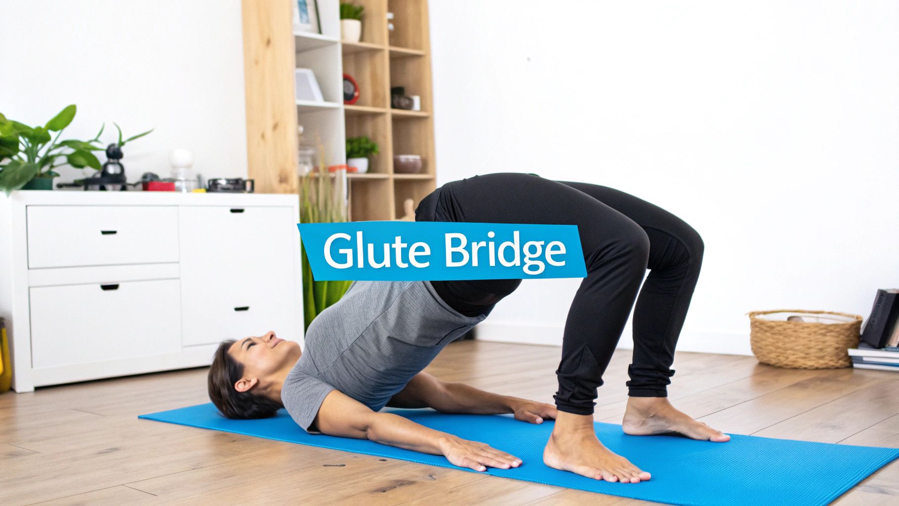 A woman performing a glute bridge exercise on a blue yoga mat, hips lifted.