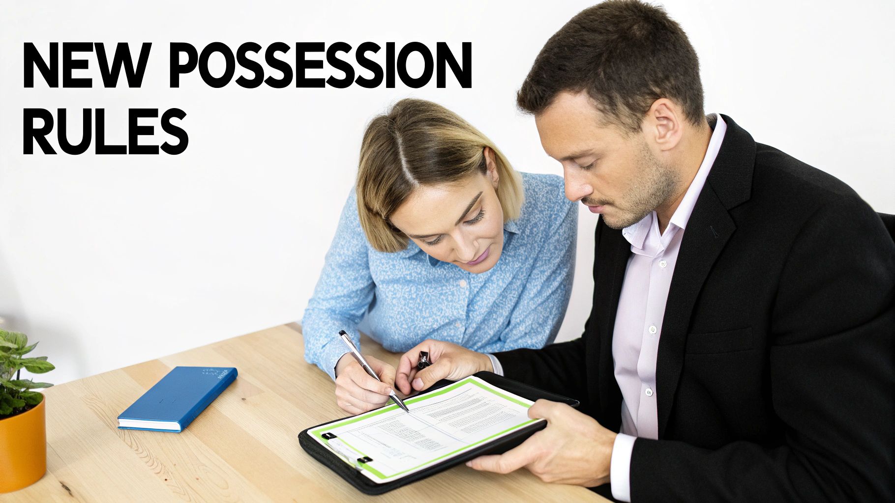 Two people, a man and a woman, review and sign a legal document together at a desk.