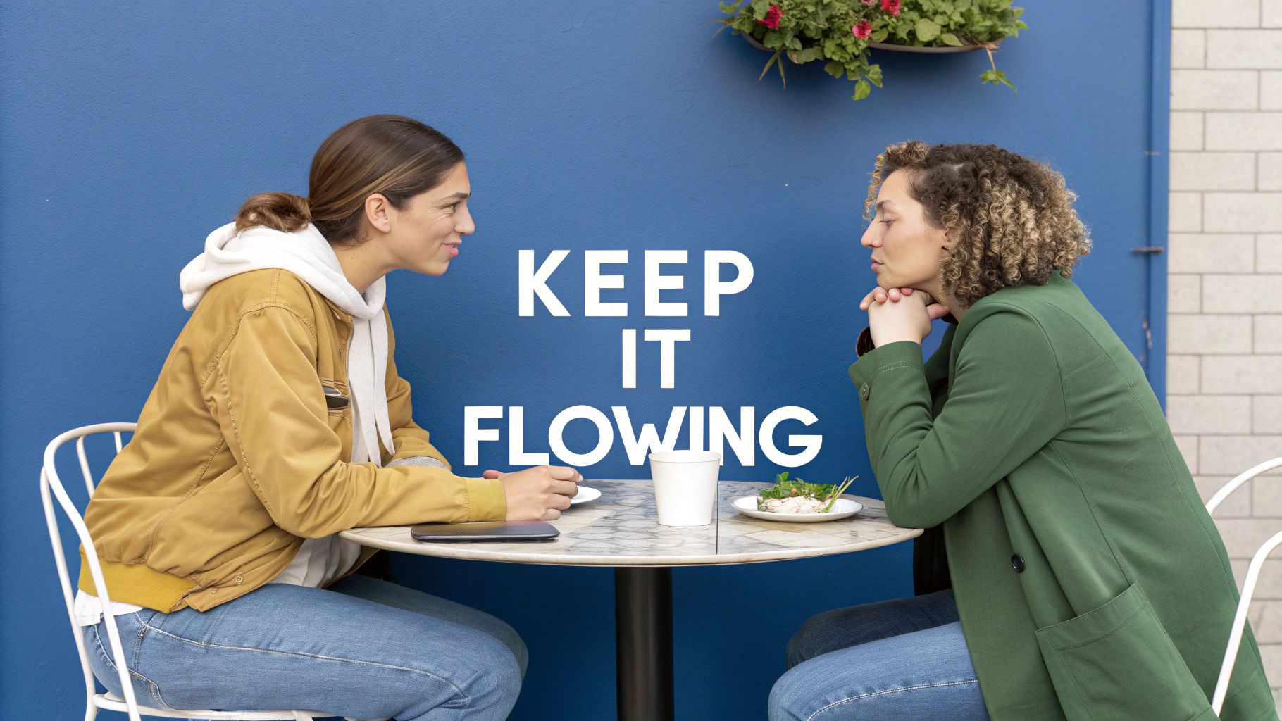 Two people having a friendly chat over coffee