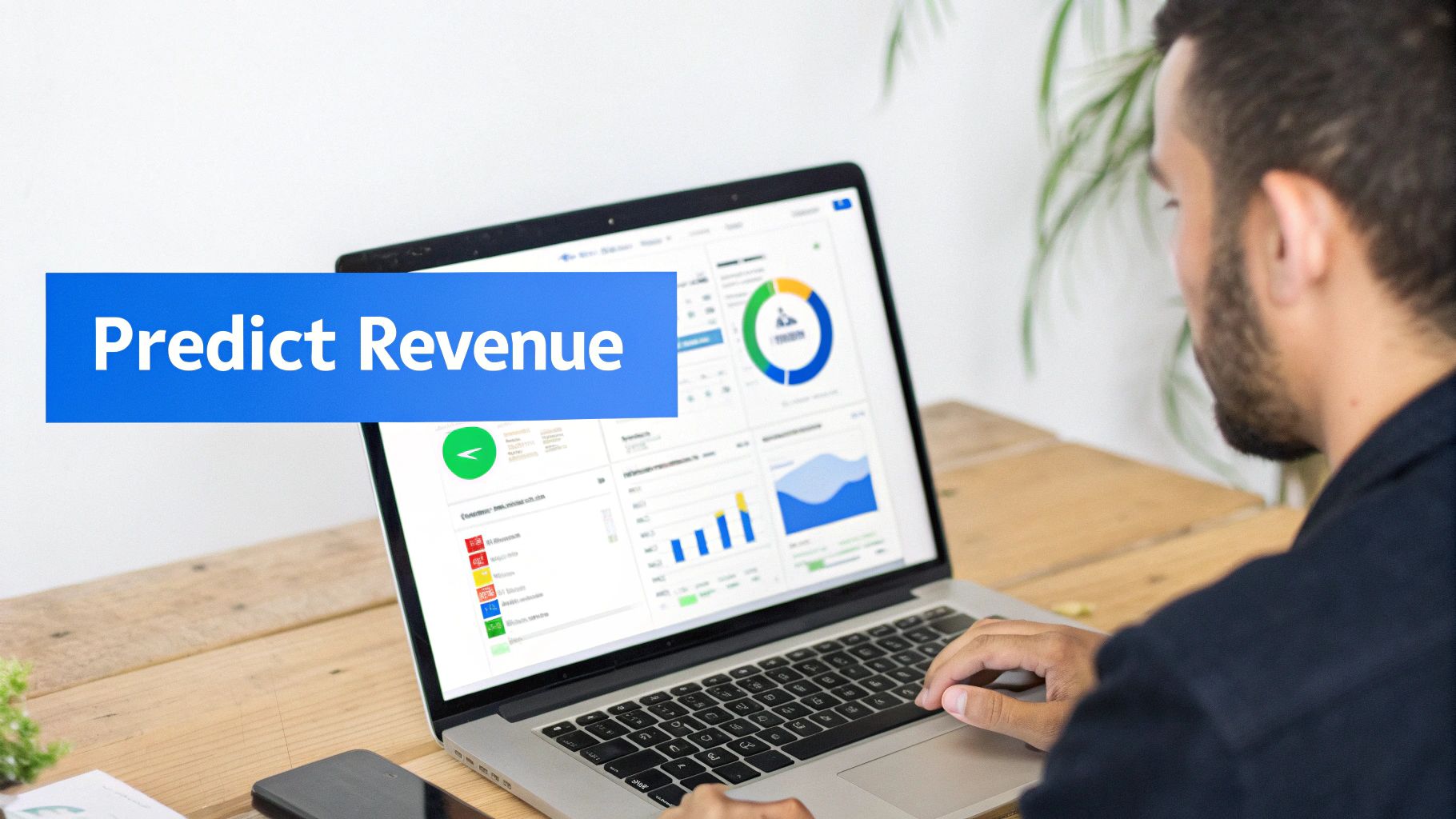 A man uses a laptop displaying data analytics charts and a 'Predict Revenue' banner.