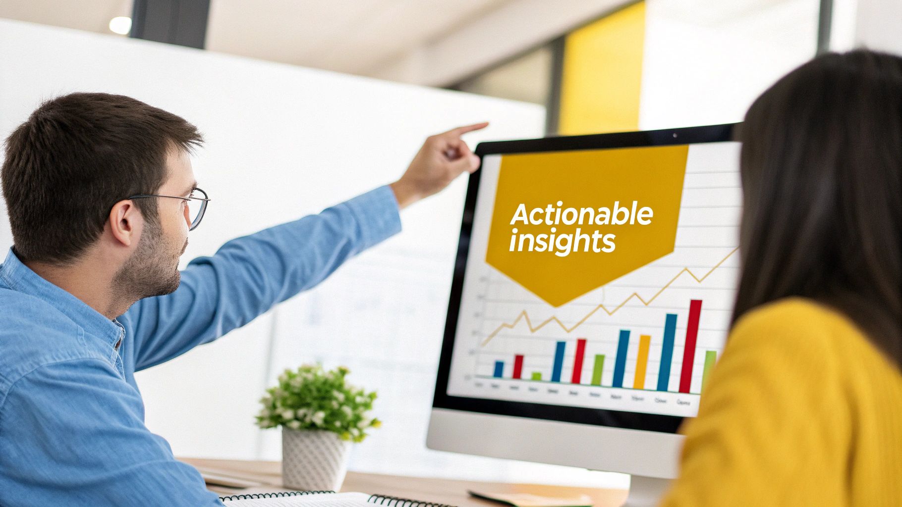 A man points at a computer screen showing "Actionable insights" and various data graphs.