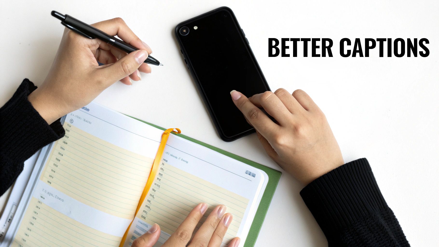 Hands writing in a notebook with a pen and using a smartphone on a clean white desk, flat lay.