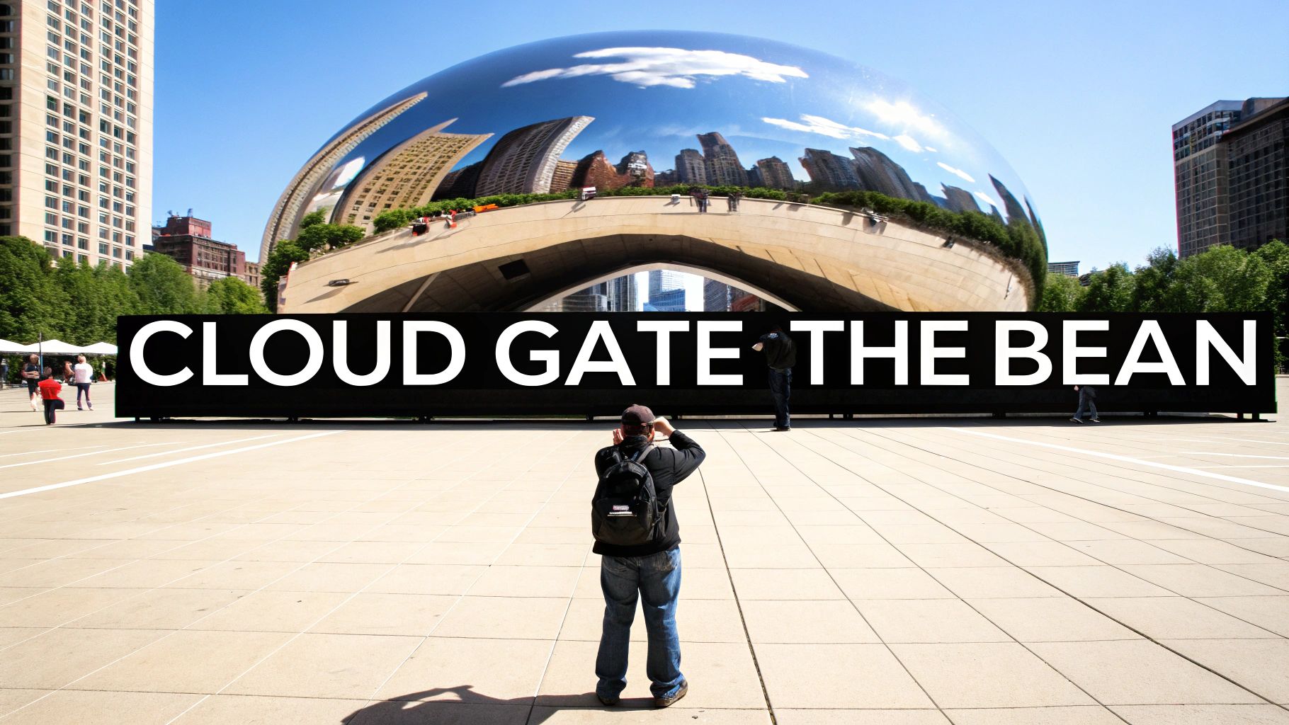 A person photographs Cloud Gate, also known as The Bean, in Chicago with city reflections.