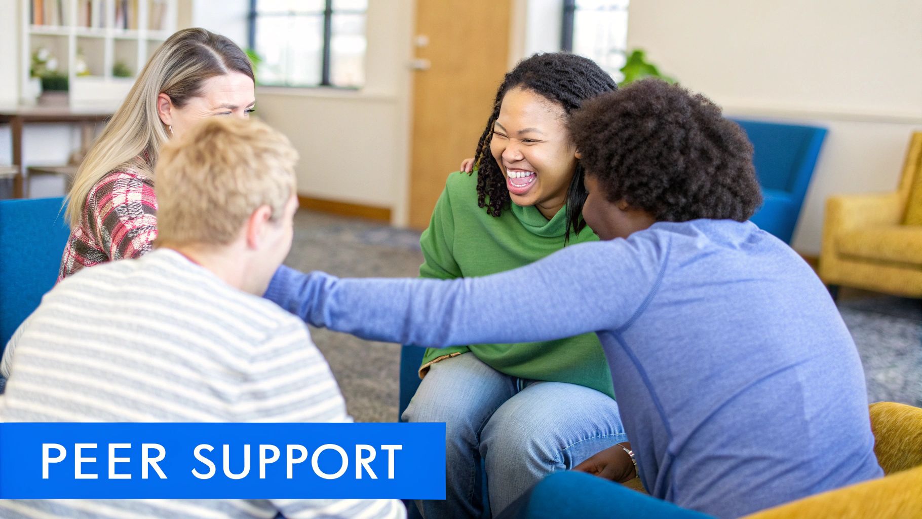 A group of people sitting in a circle during a therapy session, offering support.