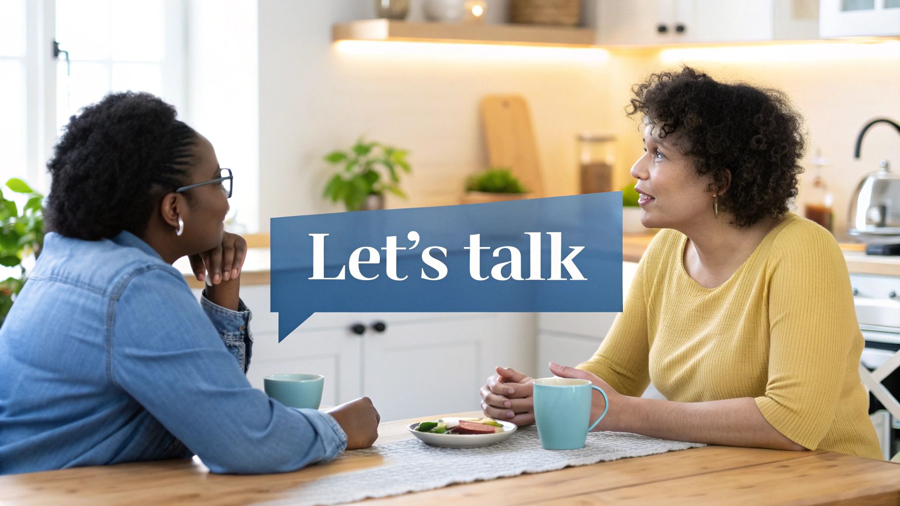 Two people having a serious but calm conversation at a table.