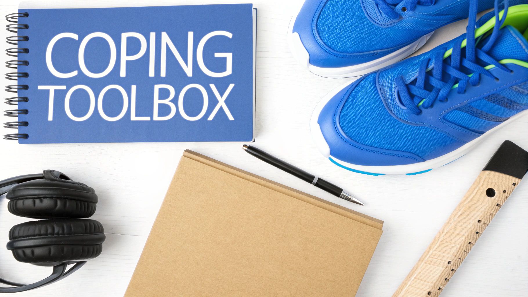 A person mindfully assembling a wooden toolbox, symbolizing the careful construction of coping skills.