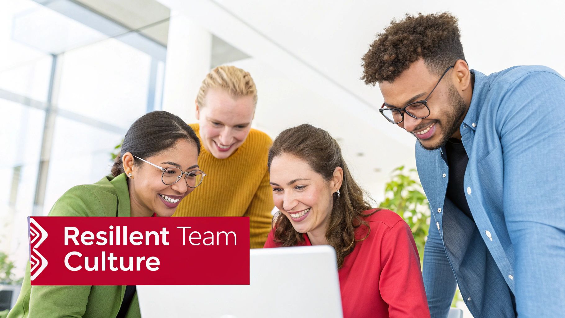 Robert LaMattina's Guide to Creating and Running a Successful Business Team members collaborating in a modern, bright office space, symbolizing a positive company culture