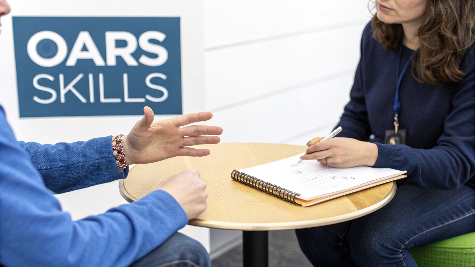 A therapist skillfully using reflective listening with a client in a bright, welcoming therapy room.
