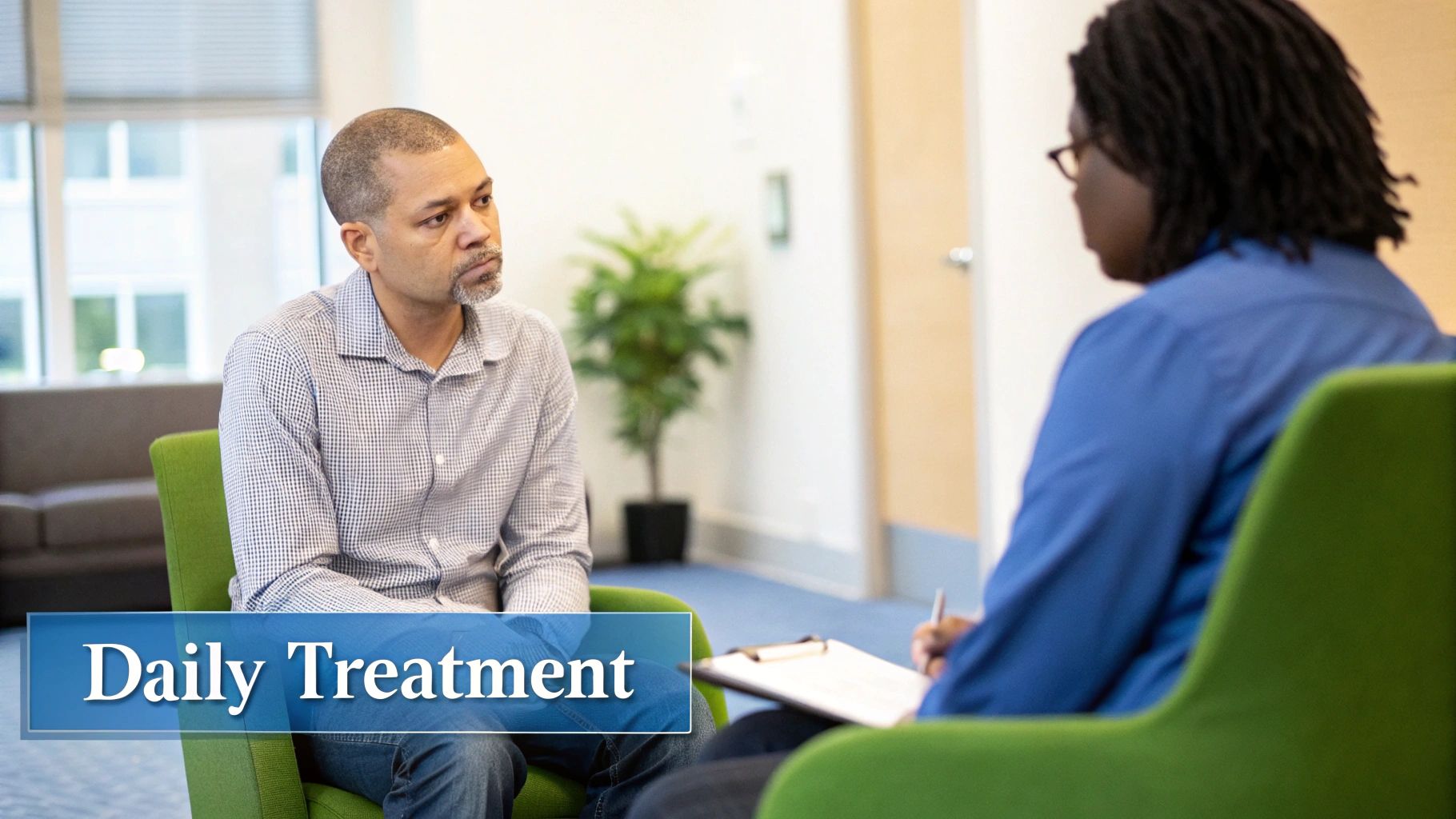 A therapist talking with a patient in a comfortable, well-lit room, illustrating a one-on-one counseling session.