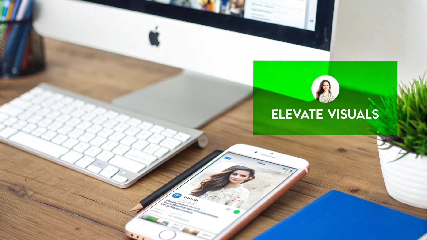 A modern workspace with an iMac, keyboard, smartphone displaying a profile, and a green 'ELEVATE VISUALS' graphic.