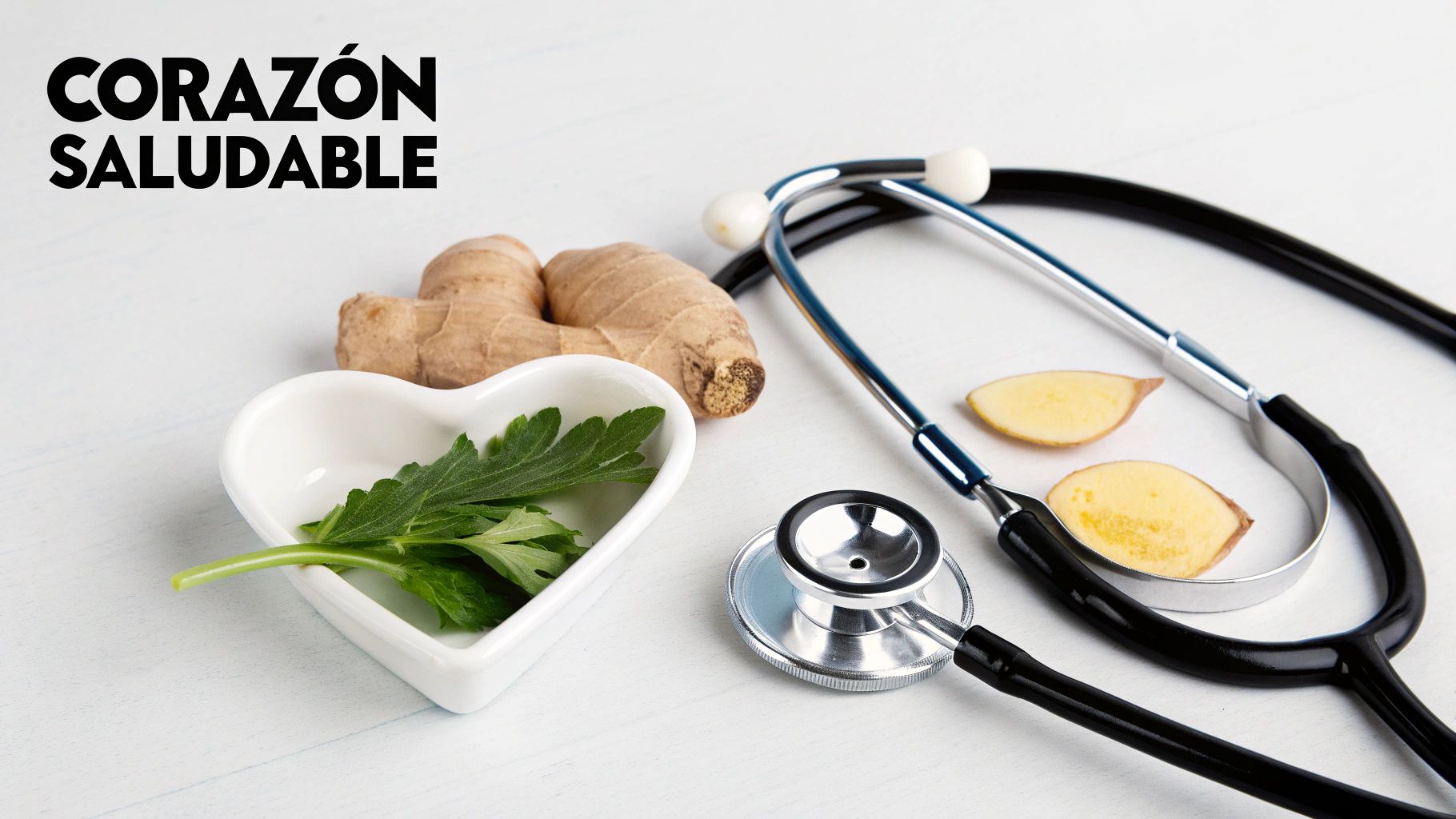 Estetoscopio junto a jengibre y hojas verdes en un tazón de corazón, con el texto 'Corazón Saludable'.