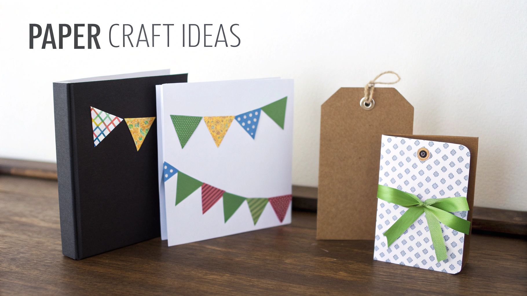 A collection of handmade greeting cards, gift tags, and planner dividers made with colorful scrapbook paper.