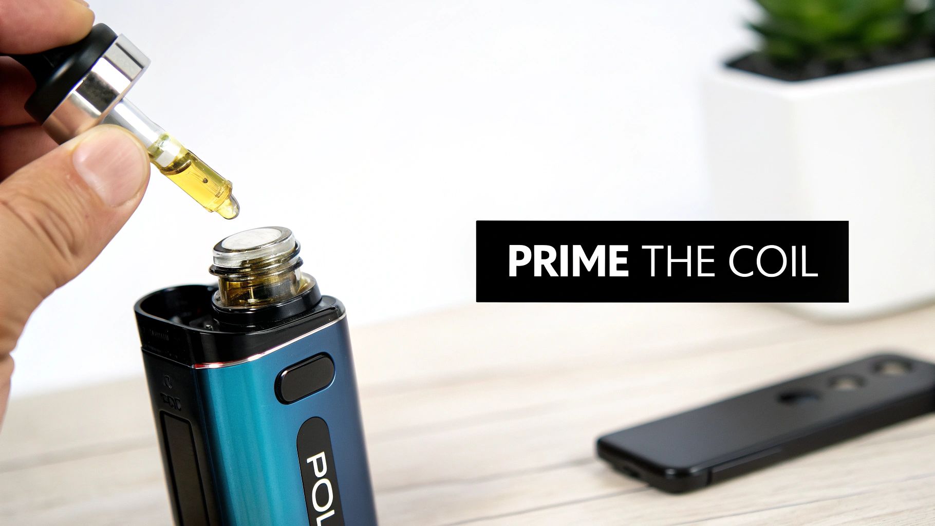 A person priming a vape coil by dropping e-liquid into a blue and black vape device.
