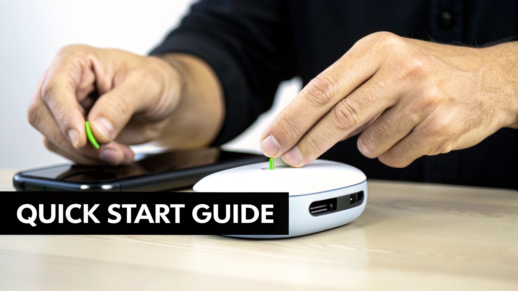 Close-up of a person inserting a green component into a white electronic device, with a smartphone nearby, and 'Quick Start Guide' text.