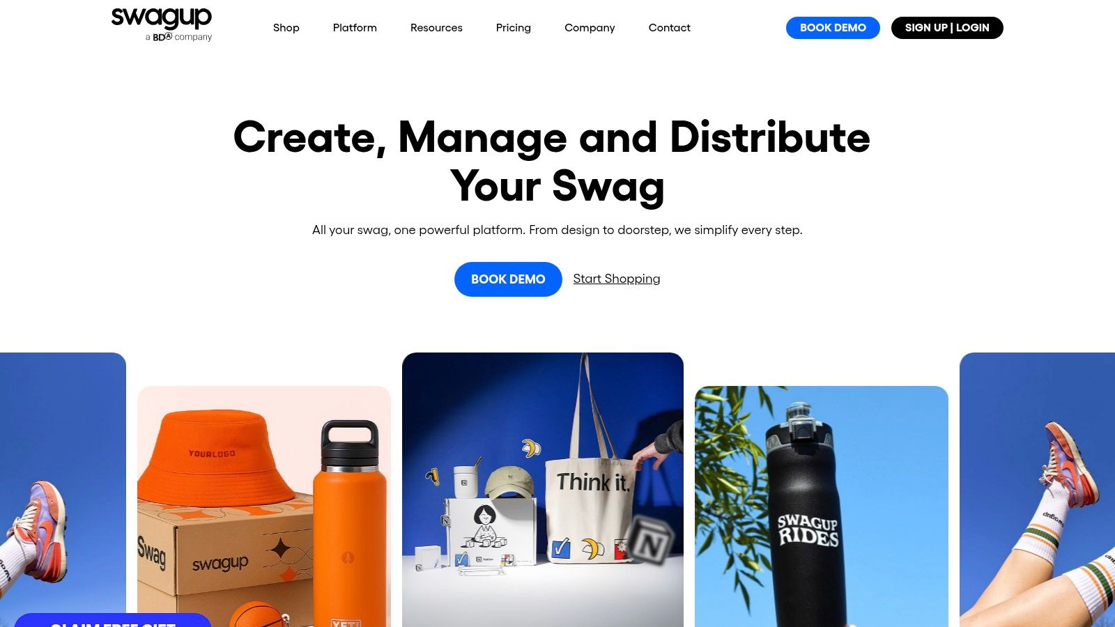 A branded gift box from SwagUp displaying custom client appreciation gifts ideas, including a notebook, pen, and other merchandise.