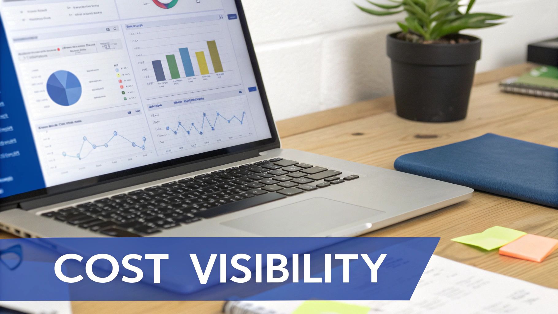 Laptop displaying financial charts and graphs for cost visibility on a wooden desk.