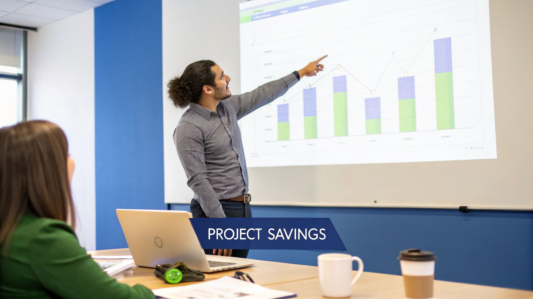Business professional presenting project savings data charts and graphs during office meeting presentation