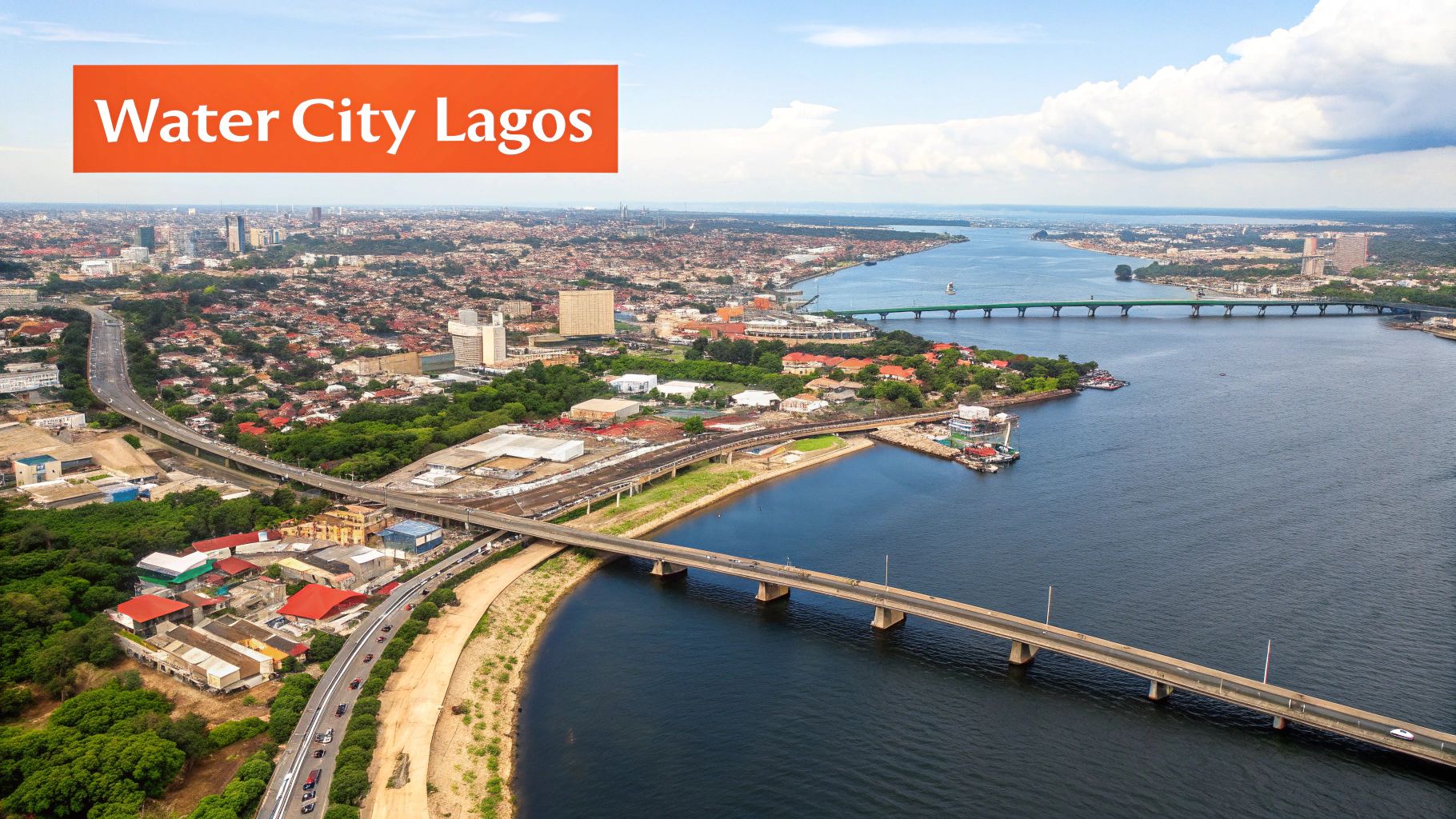 An aerial view of the Third Mainland Bridge stretching over the Lagos Lagoon, connecting the islands to the mainland with the city skyline in the background.