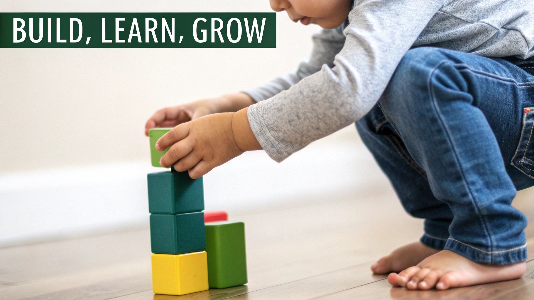 A toddler building a tower with colorful blocks on a wooden floor, with text 'BUILD, LEARN, GROW'.