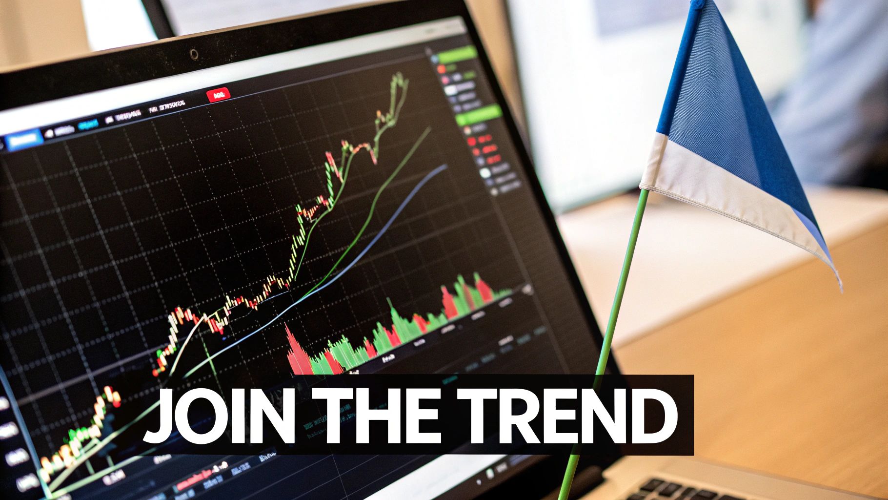 A laptop displays financial charts with 'JOIN THE TREND' text, symbolizing stock market or forex trading.