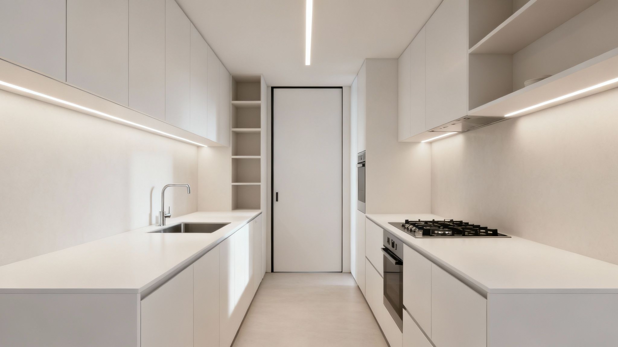 A sleek, modern minimalist galley kitchen in white, featuring a sink, stove, oven, and integrated lighting.