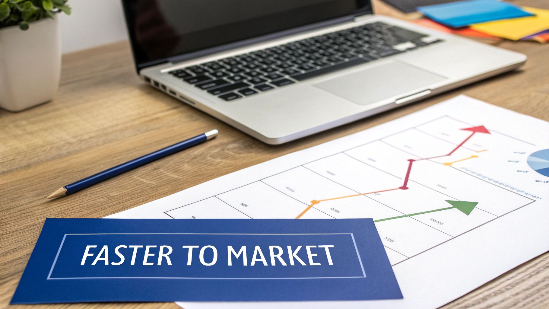 A team of professionals collaborating around a table with laptops and charts, symbolizing strategic planning and innovation.