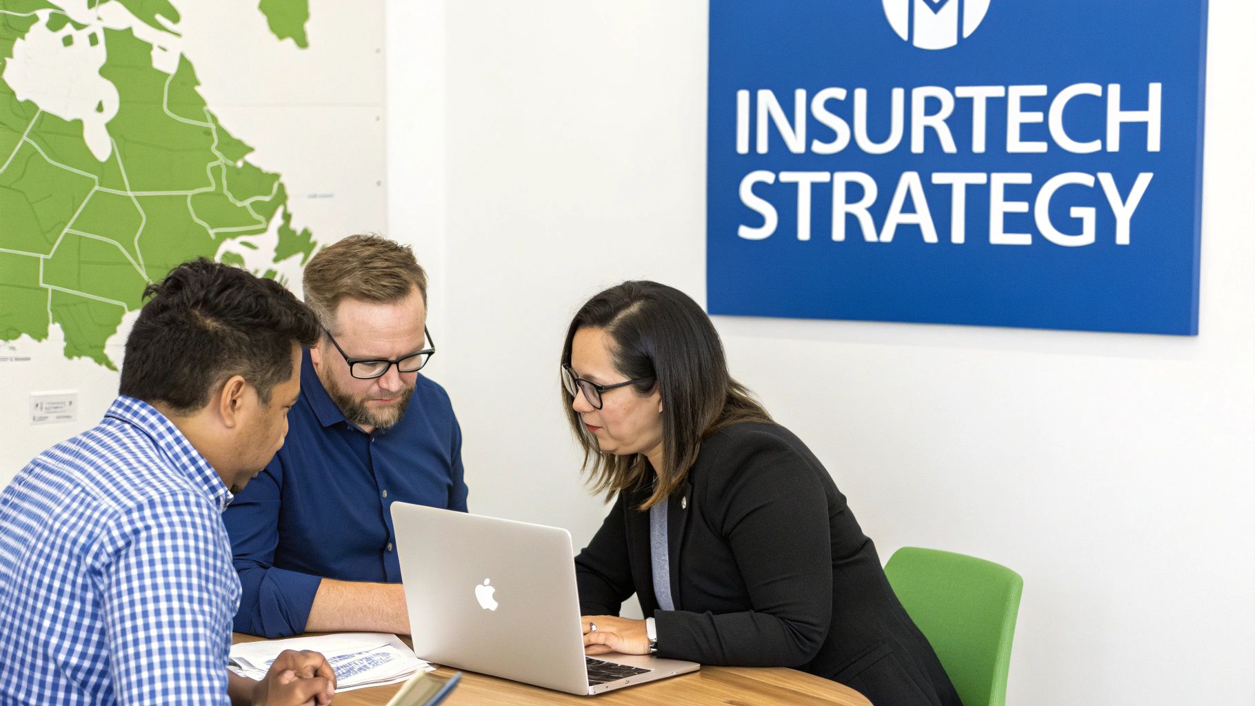 A modern office setting where a team is collaborating on a project, representing strategic planning for an insurtech solution.