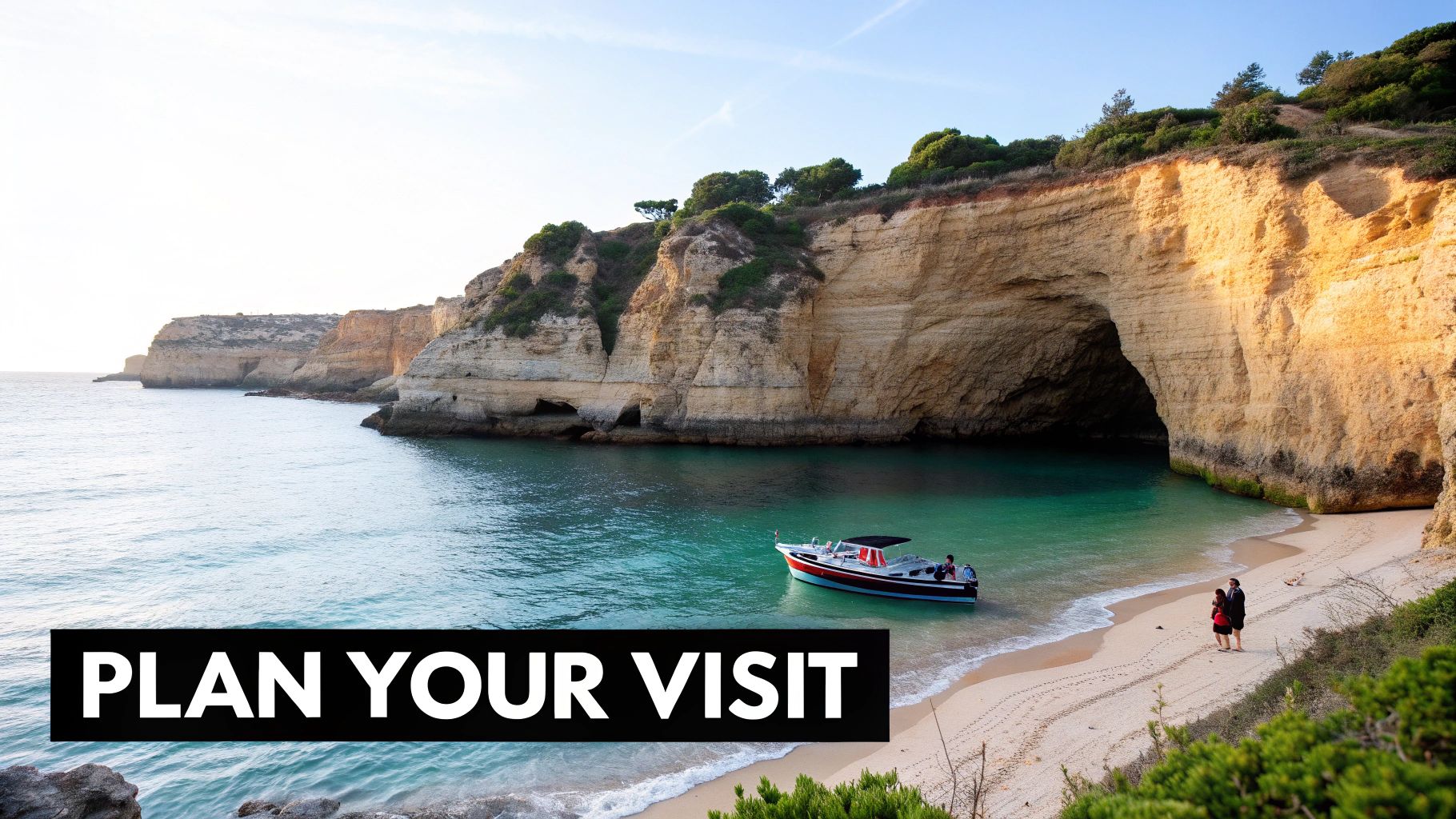 A scenic view of the Benagil Caves coastline in Portugal, with turquoise water, golden cliffs, and a sandy beach.