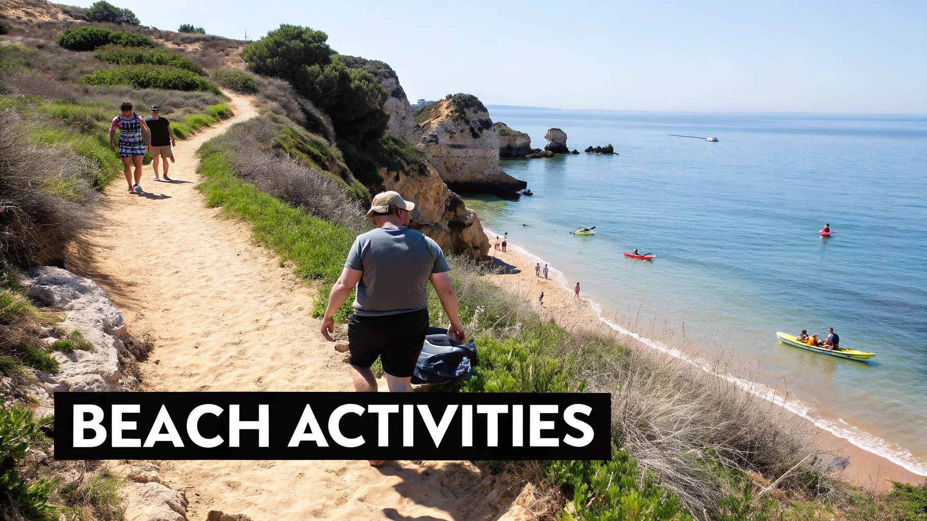 Scenic view of a sandy path leading to a beach with cliffs and people kayaking in the ocean.