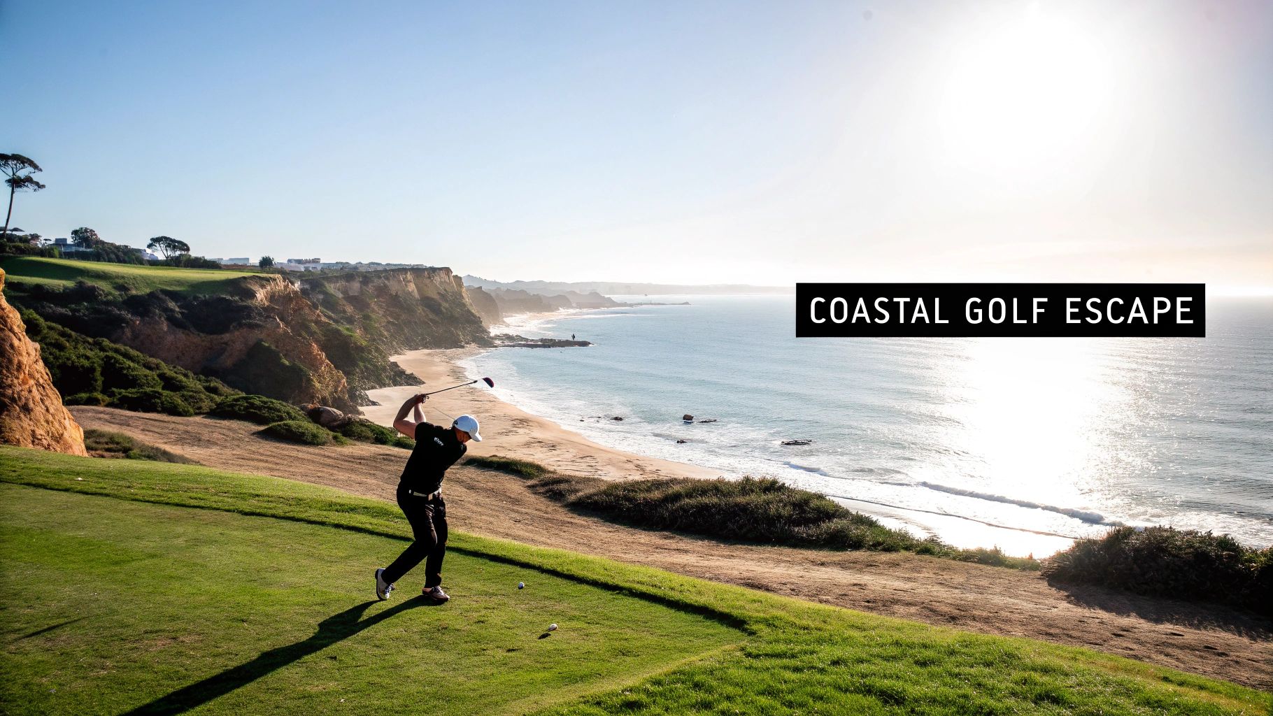 Golfer teeing off at a beautiful coastal golf course with cliffs and ocean views.