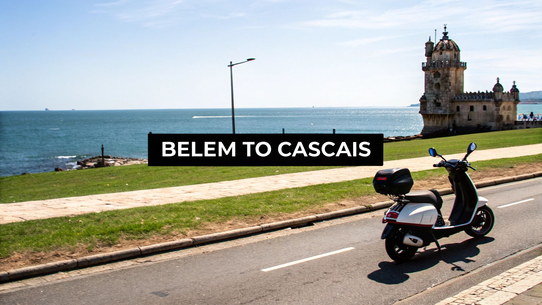 A white scooter parked on a coastal road overlooking the sea and historic Belem Tower in Lisbon.