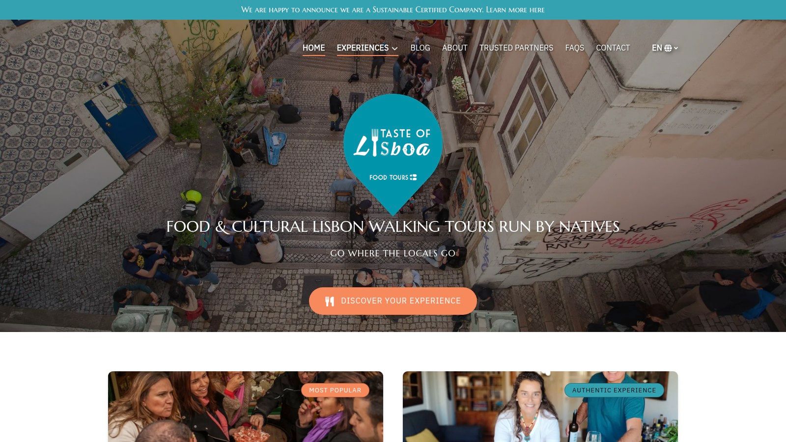 A guide from Taste of Lisboa Food Tours explaining a local dish to a group of travellers.