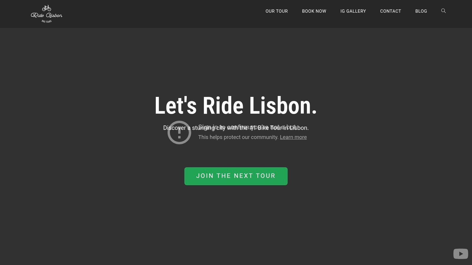 RideLisbon's website landing page showing a cyclist and the Lisbon cityscape.