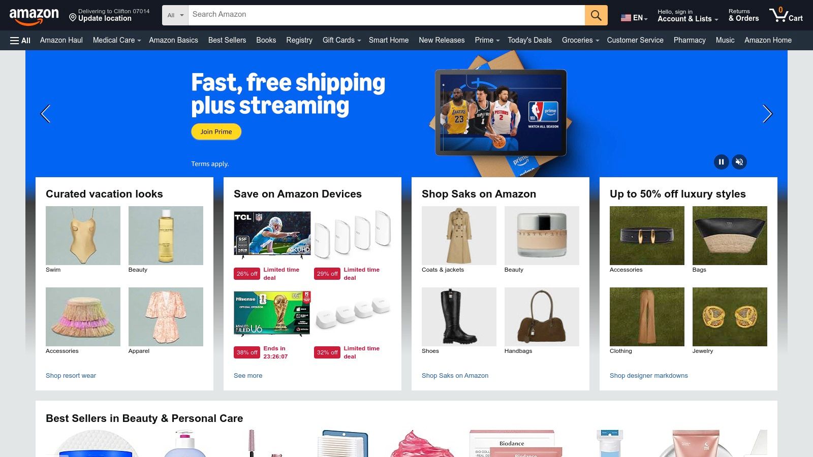 The Amazon website homepage, showing the search bar and various product categories.