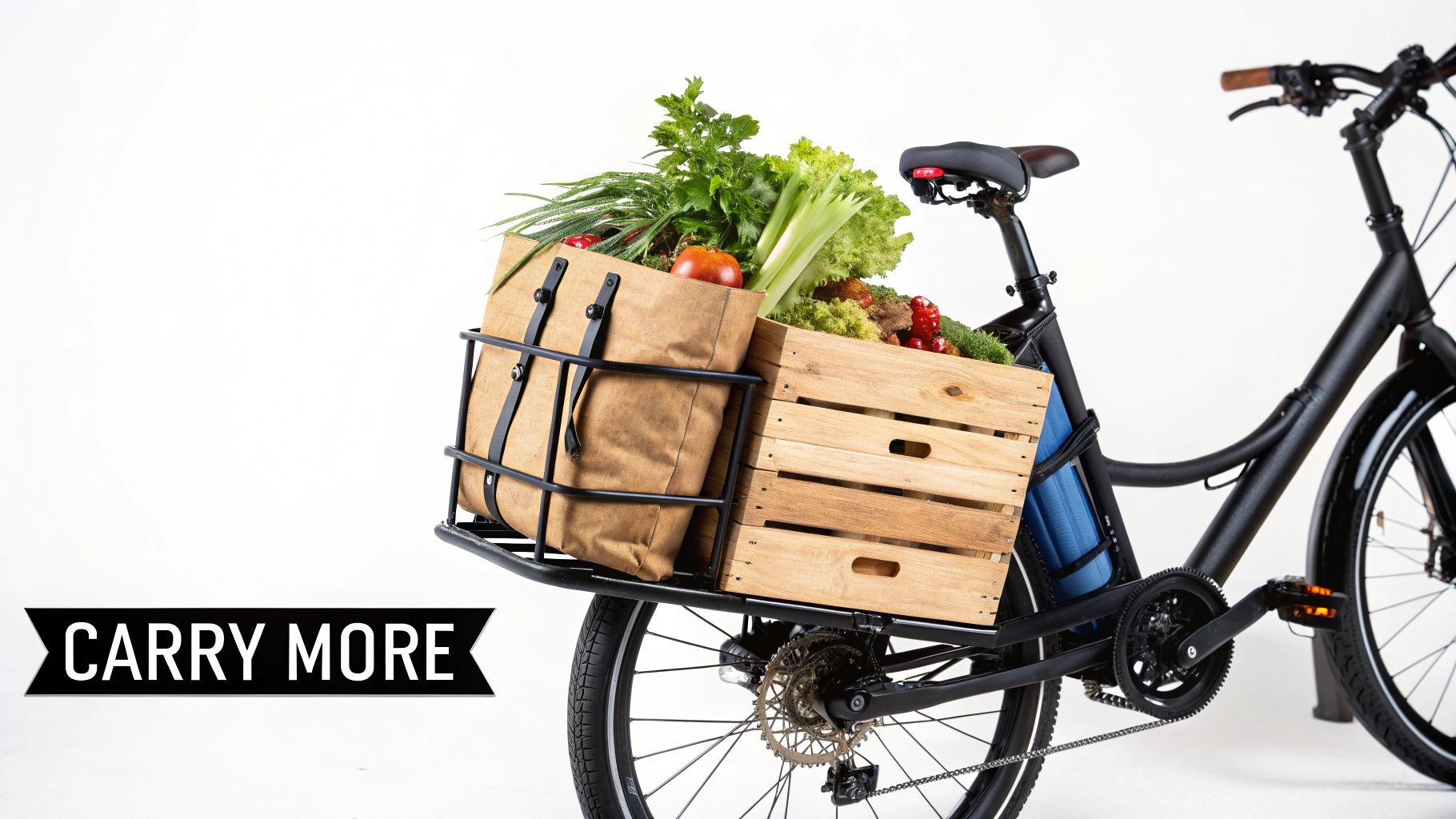 Electric cargo bike with front rack carrying wooden crate filled with fresh vegetables and grocery bags