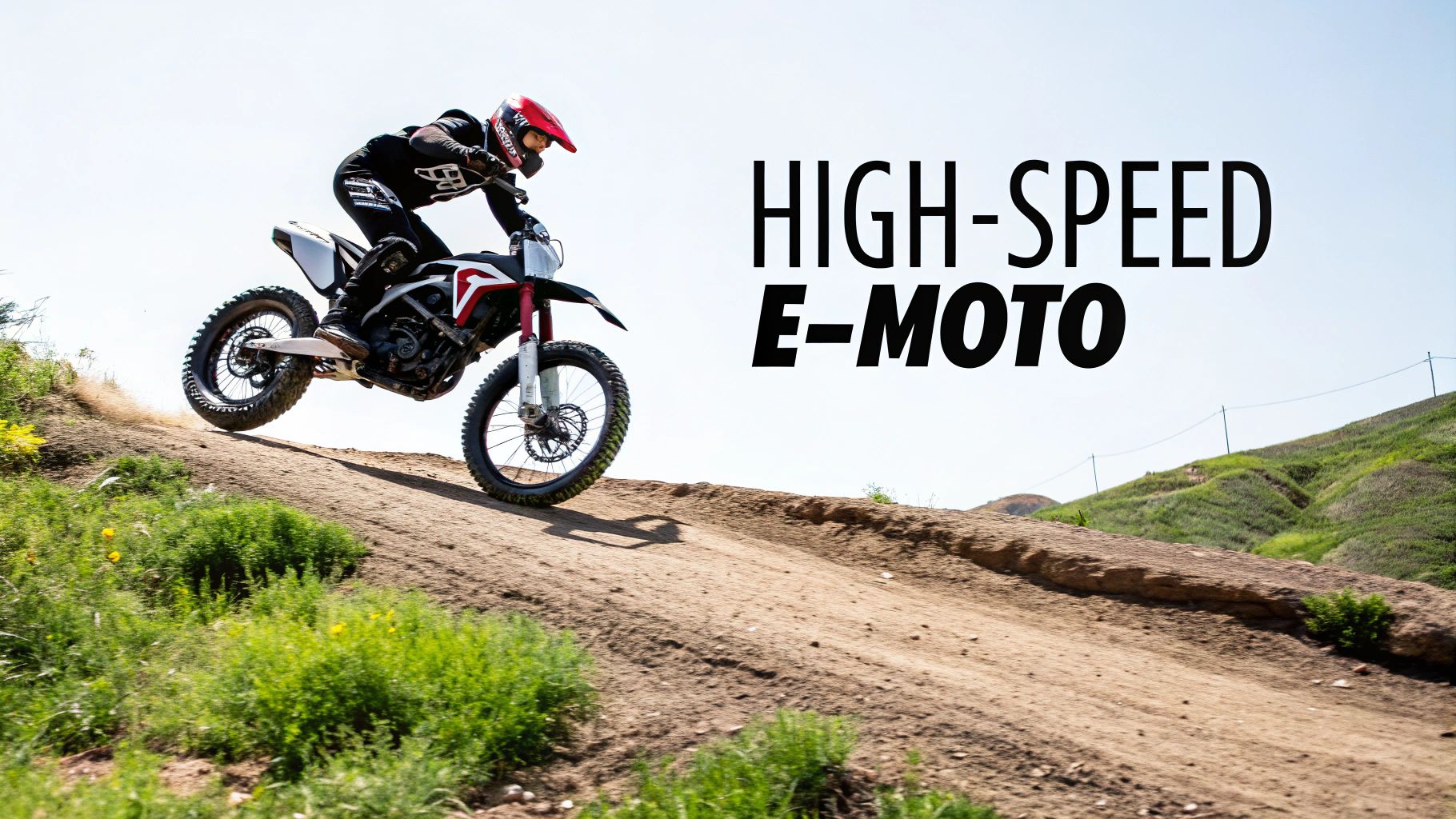 Motocross rider performing jump on electric motorcycle on dirt track demonstrating high speed capability