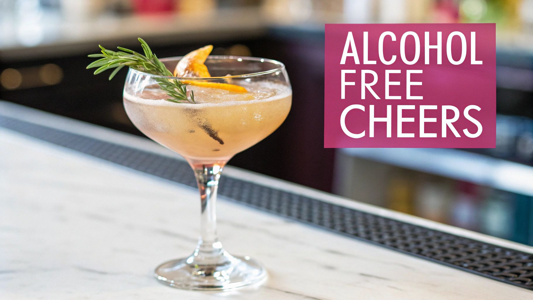 A refreshing alcohol-free cocktail, garnished with rosemary and orange peel, on a white marble bar. Text: ALCOHOL FREE CHEERS.